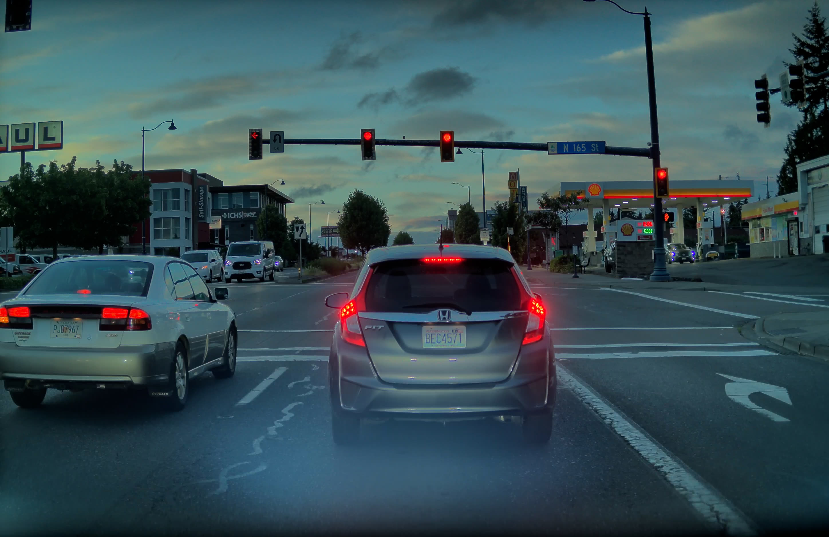 Right-turn-only lane marking and sign at Aurora Ave N and N 165th St